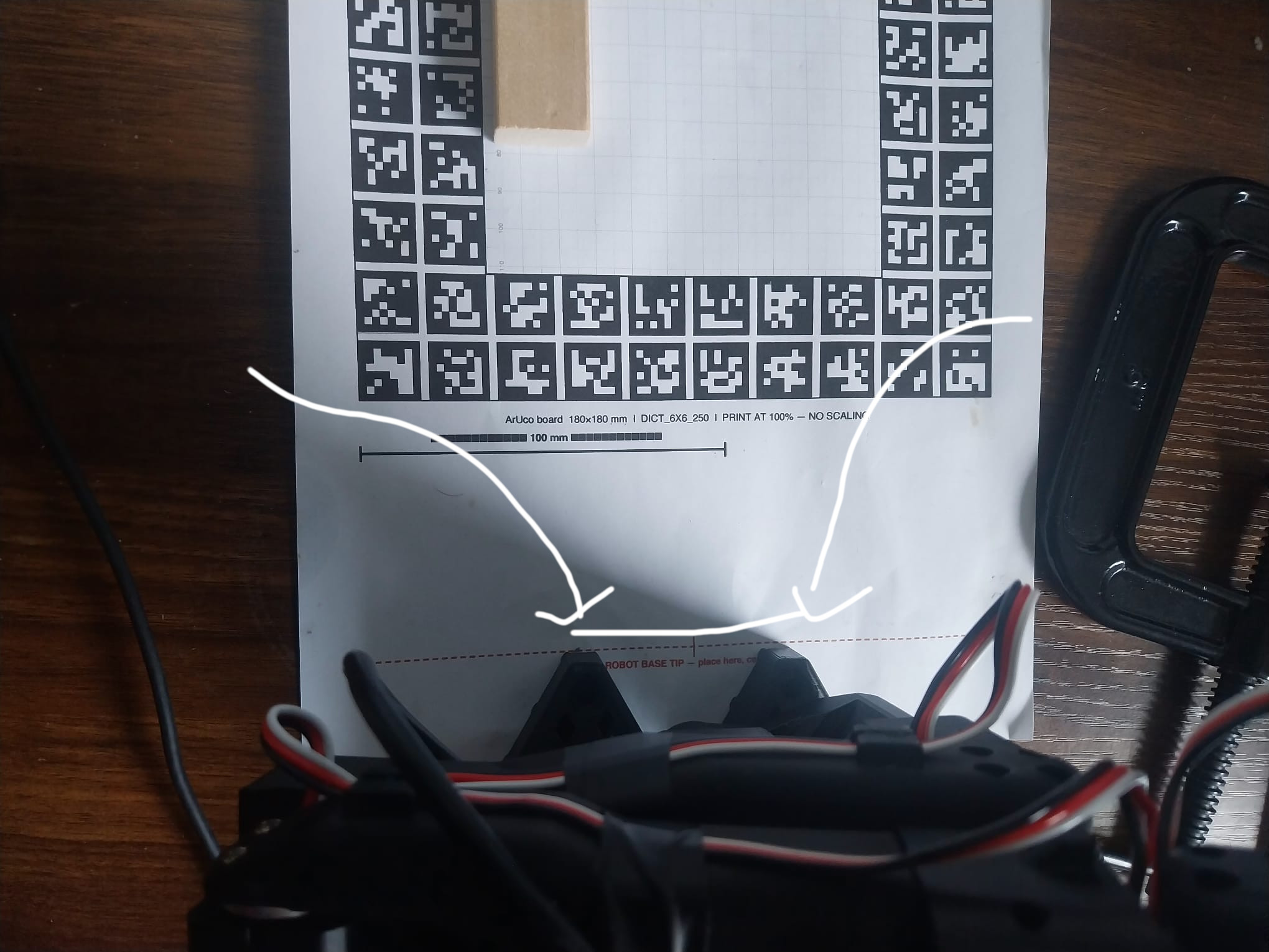 image of camera behind dotted line